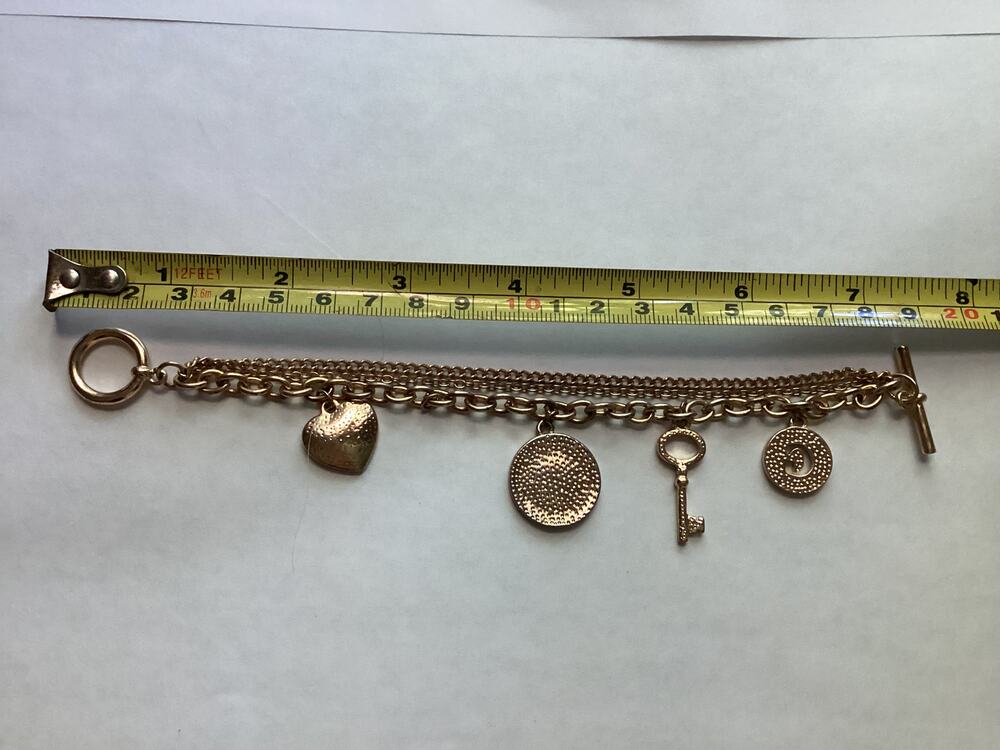 1779 Guess Brand Gold Charm Bracelet Guess logo hearts keys decorative elements